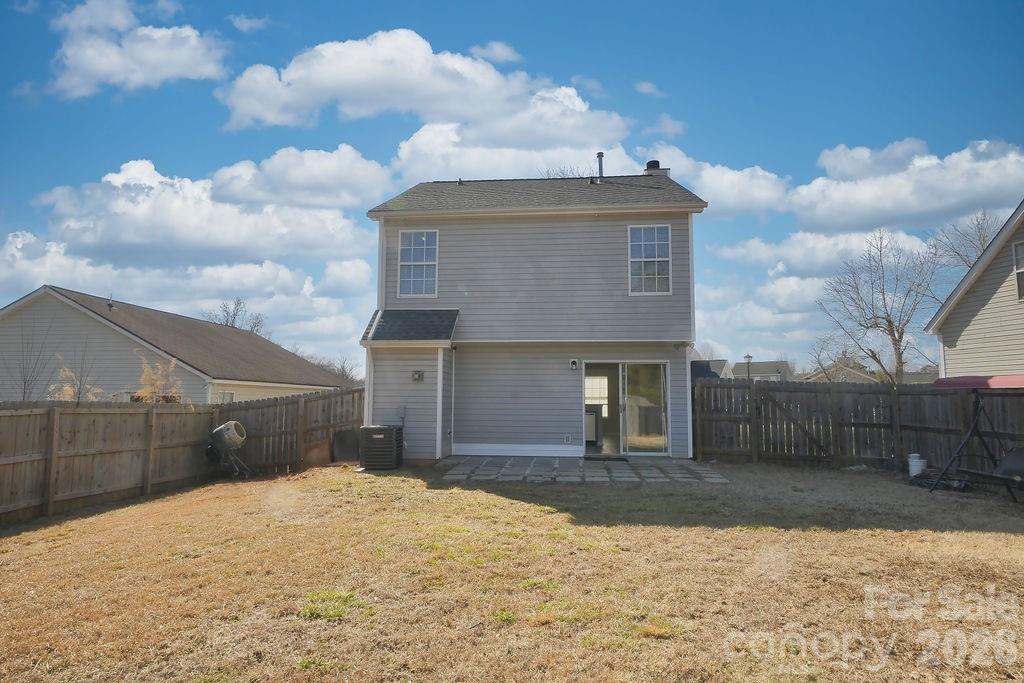 9614 Rau Court Charlotte, NC 28215 - Photo 21 of 21 a front view of a house with a yard