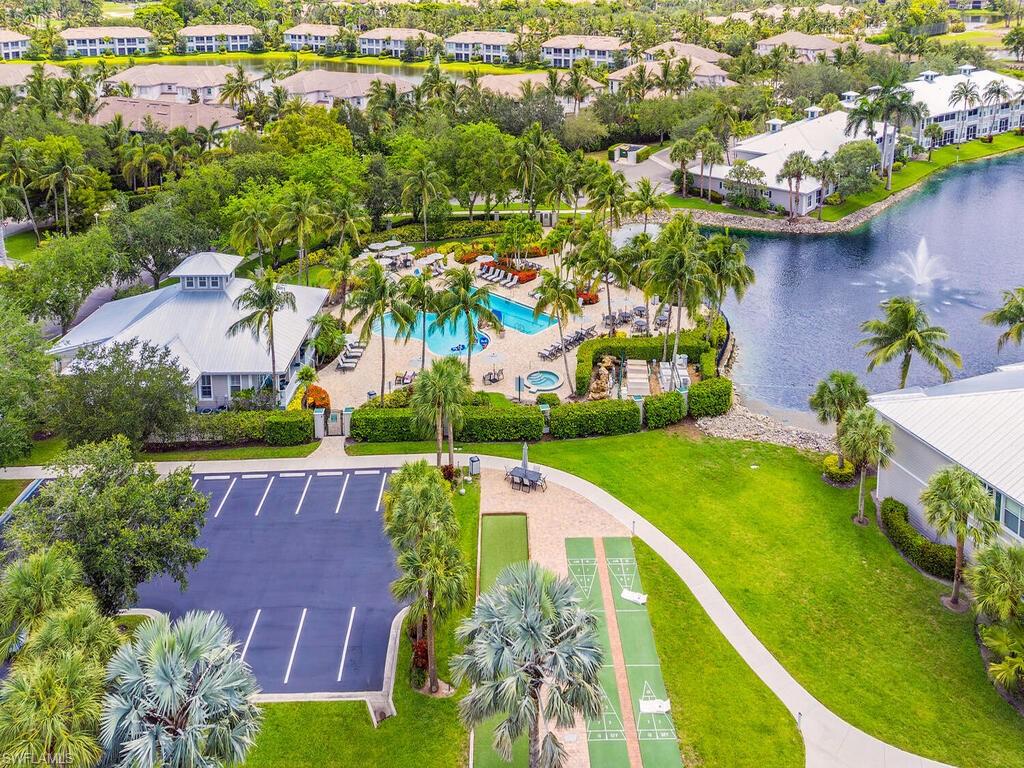 7970 Mahogany Run Lane, Unit 216 Naples, FL 34113 - Photo 14 of 29 an aerial view of a house with a yard swimming pool outdoor seating and entertaining space