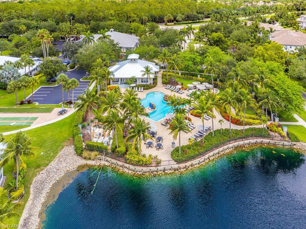 7970 Mahogany Run Lane, Unit 216 Naples, FL 34113 - Photo 15 of 29 an aerial view of a house with a yard basket ball court and outdoor seating