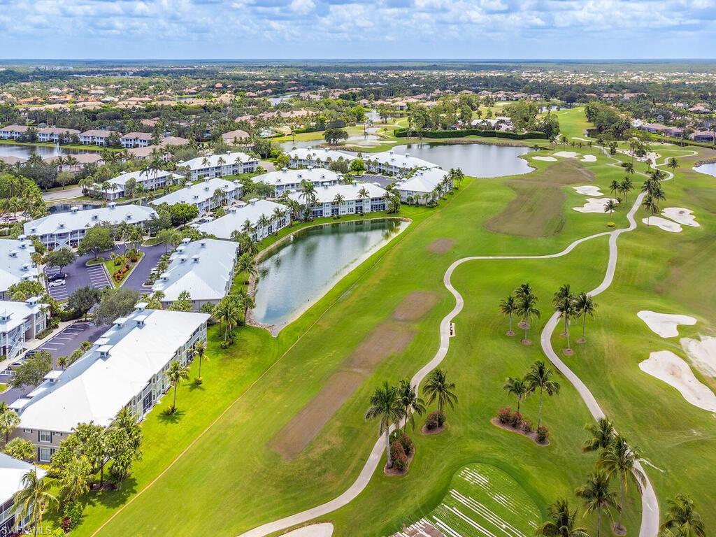 7970 Mahogany Run Lane, Unit 216 Naples, FL 34113 - Photo 20 of 29 an aerial view of residential houses with outdoor space