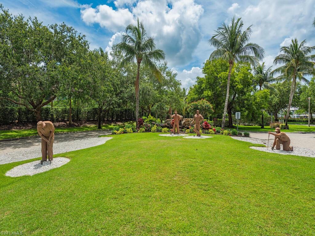7970 Mahogany Run Lane, Unit 216 Naples, FL 34113 - Photo 26 of 29 a view of a park with swings and slides