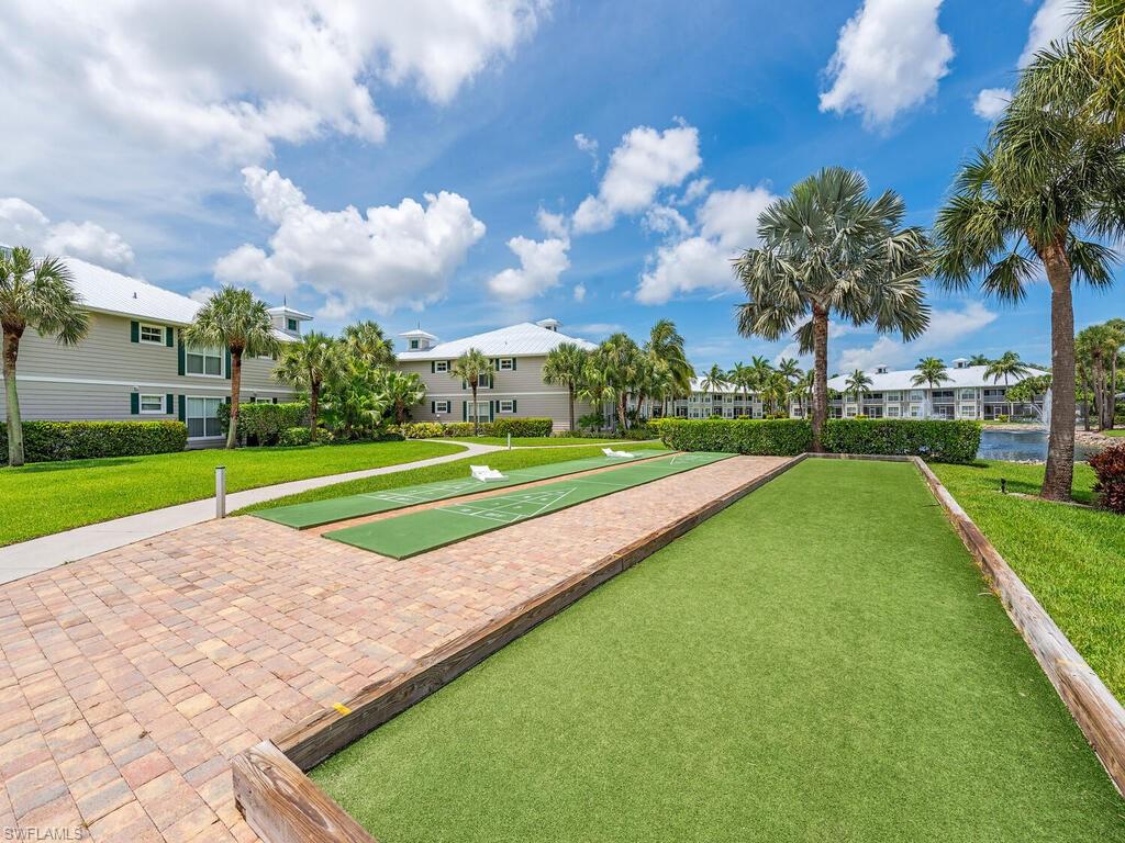 7970 Mahogany Run Lane, Unit 216 Naples, FL 34113 - Photo 28 of 29 a view of a golf course