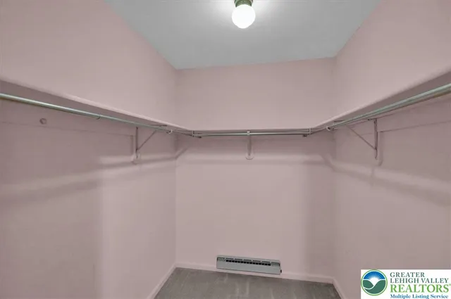 a view of an empty walk in closet