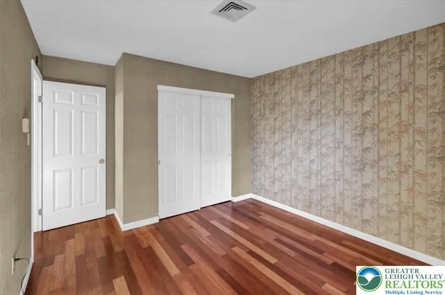 a view of small space with wooden floor