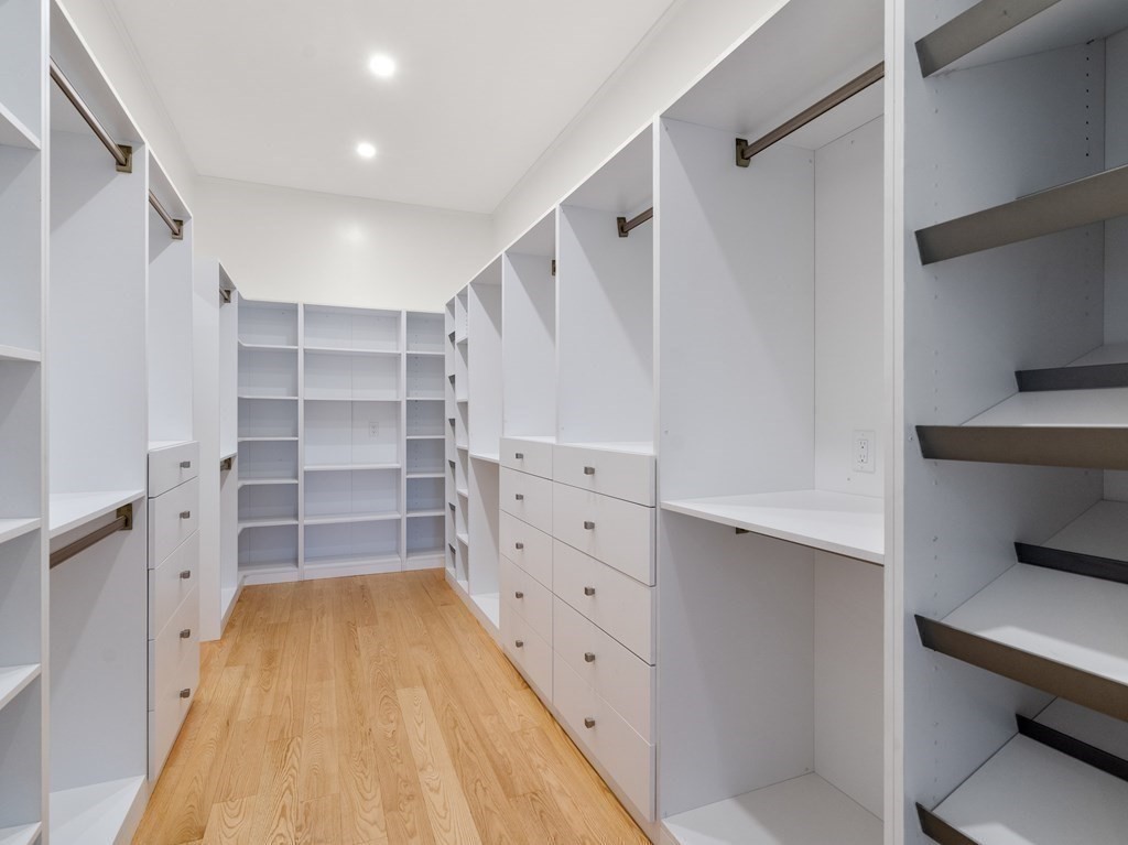 62 Stanley Road Newton, MA 02468 - Photo 33 of 41 a view of walk in closet with empty racks