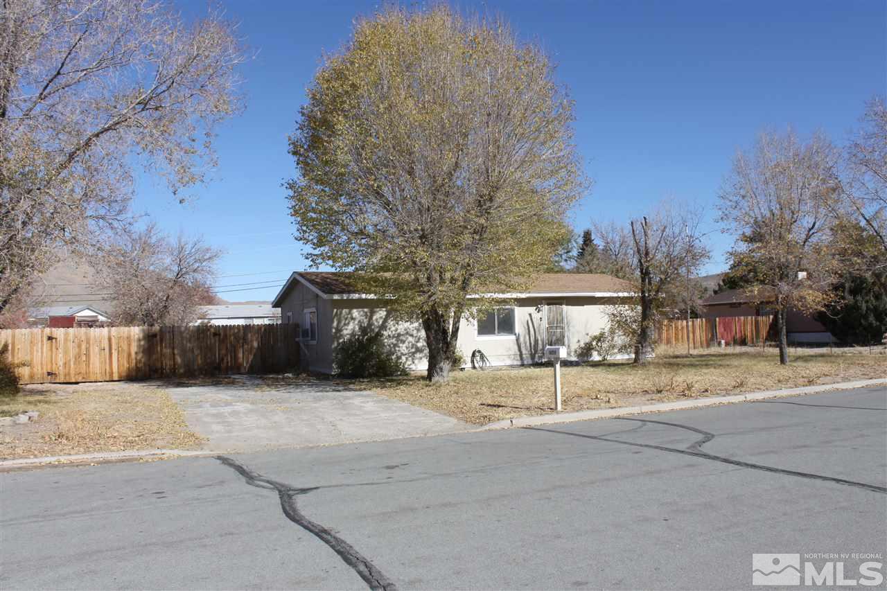 17645 Macaw Lane Reno, NV 89508 - Photo 18 of 19 a view of a house with large trees and a big yard