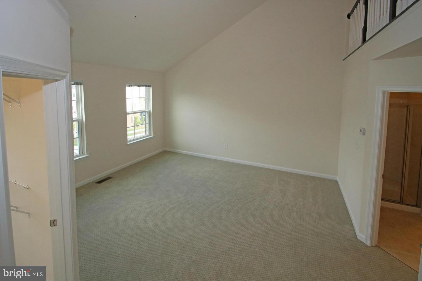 2482 Baldwin Crescent Northeast Washington, DC 20018 - Photo 15 of 28 an empty room with windows