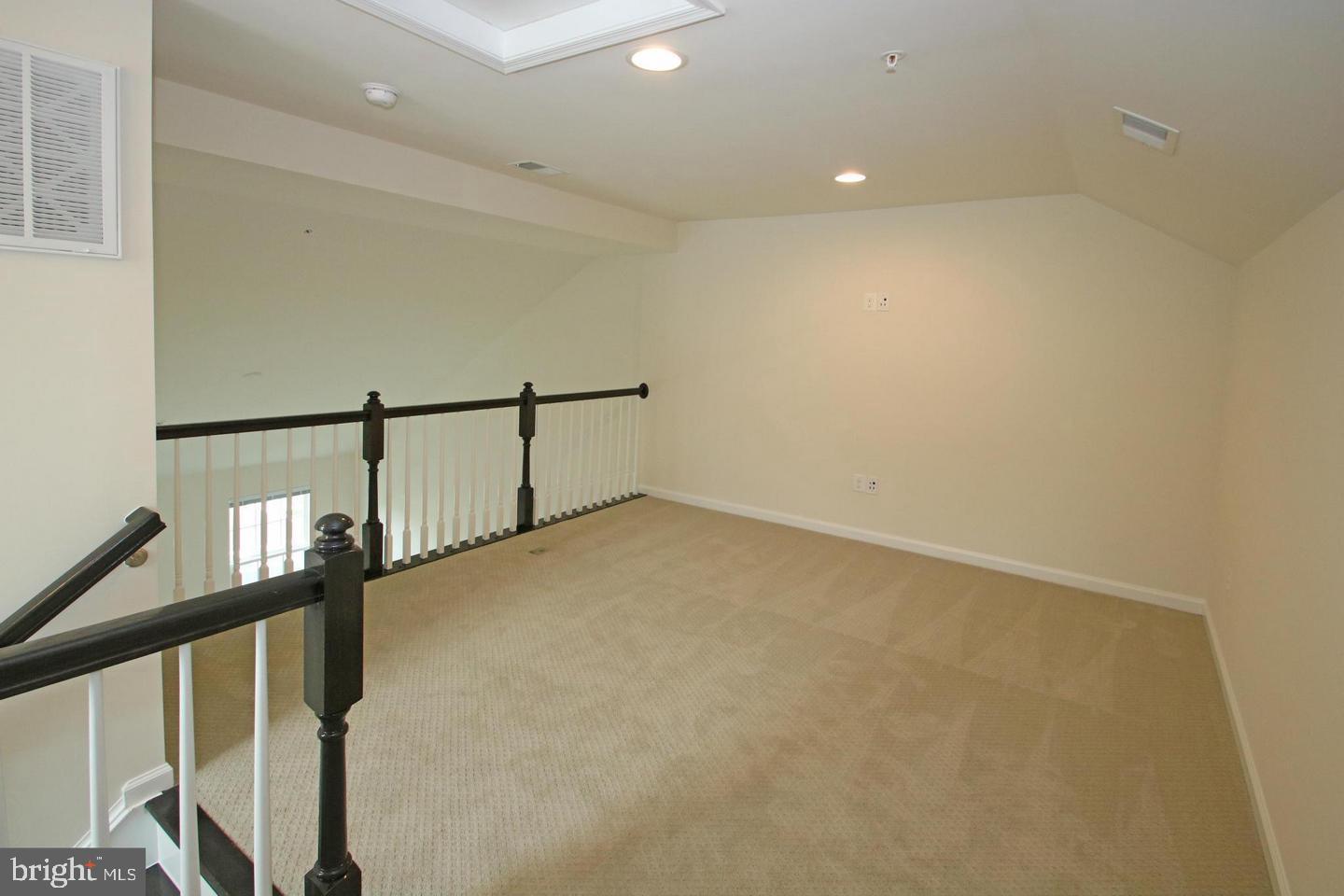 2482 Baldwin Crescent Northeast Washington, DC 20018 - Photo 17 of 28 a view of an empty room