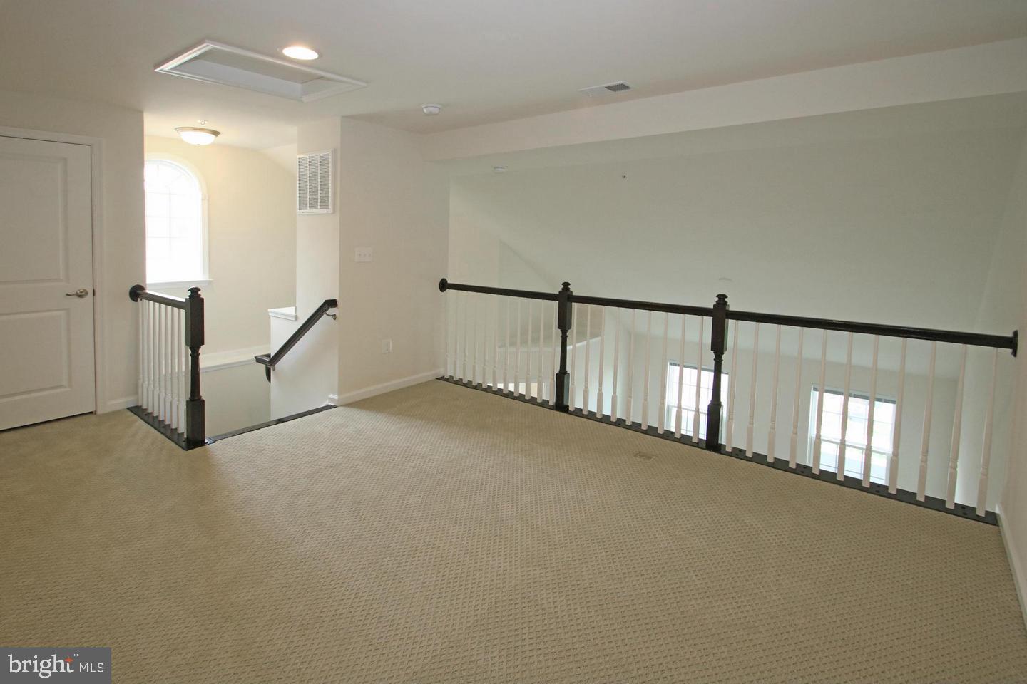 2482 Baldwin Crescent Northeast Washington, DC 20018 - Photo 18 of 28 a view of an empty room