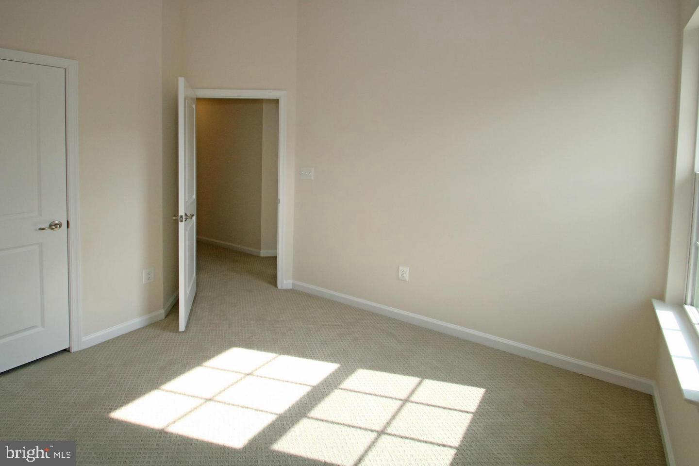 2482 Baldwin Crescent Northeast Washington, DC 20018 - Photo 21 of 28 a view of an empty room and window
