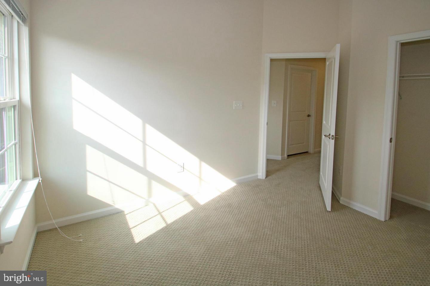 2482 Baldwin Crescent Northeast Washington, DC 20018 - Photo 22 of 28 a view of an empty room and window