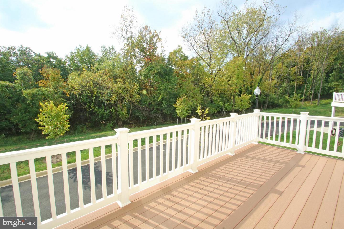 2482 Baldwin Crescent Northeast Washington, DC 20018 - Photo 25 of 28 a view of a wooden roof deck