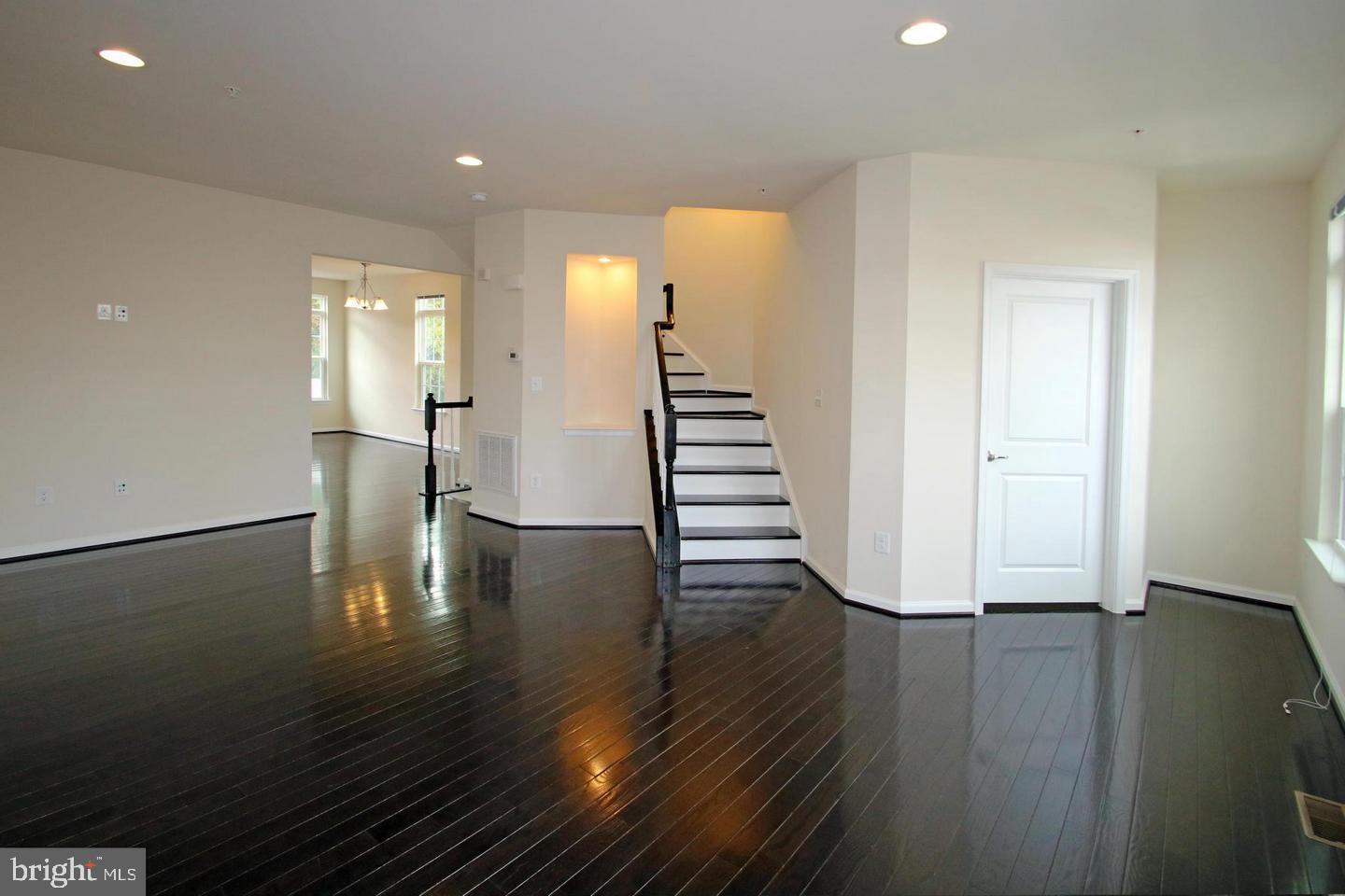 2482 Baldwin Crescent Northeast Washington, DC 20018 - Photo 7 of 28 a view of a room with wooden floor