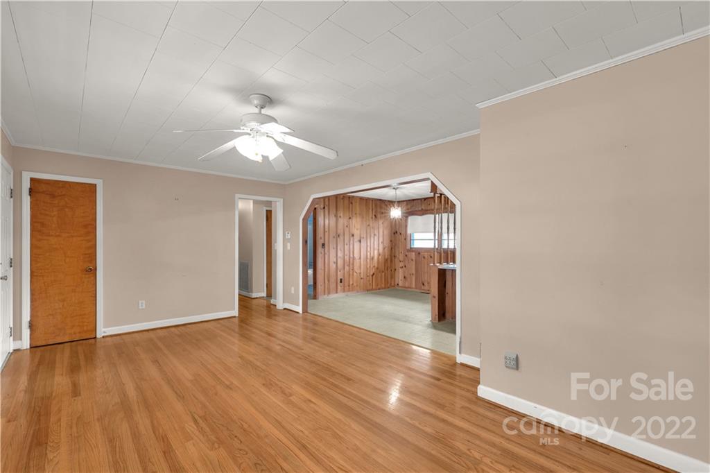 3169 Pink Plyler Road Lancaster, SC 29720 - Photo 8 of 39 wooden floor in an empty room with a window