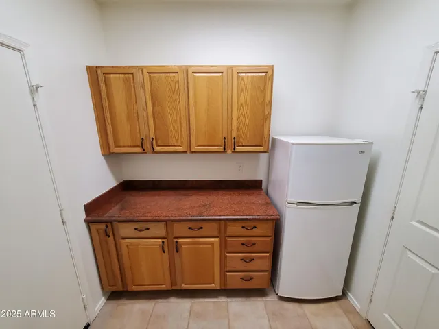 a view of a garden with potted plants