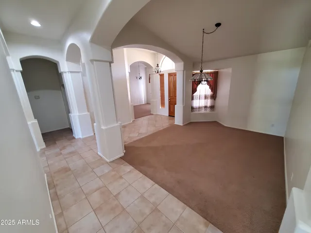 a view of a livingroom with a staircase