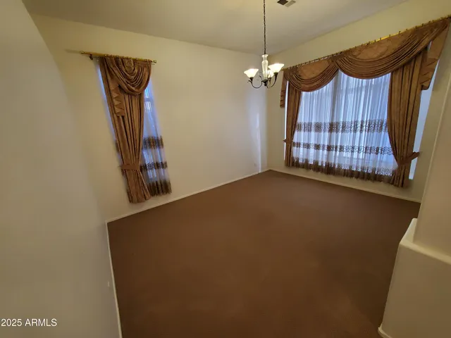 a view of a room with a chandelier