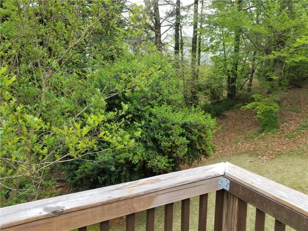 692 Shore Overlook Lithonia, GA 30058 - Photo 4 of 4 a view of a yard from a balcony