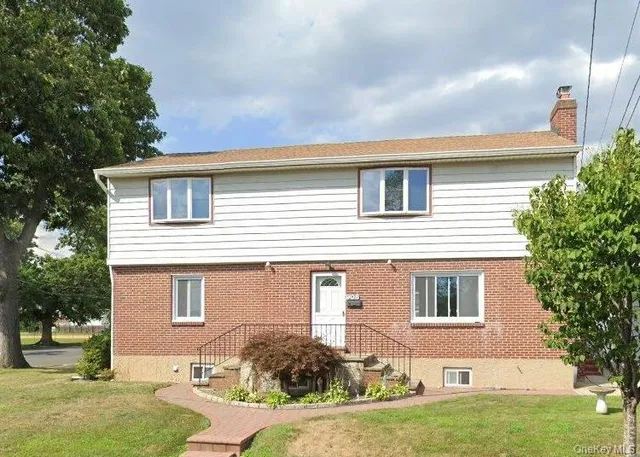 front view of house with a yard