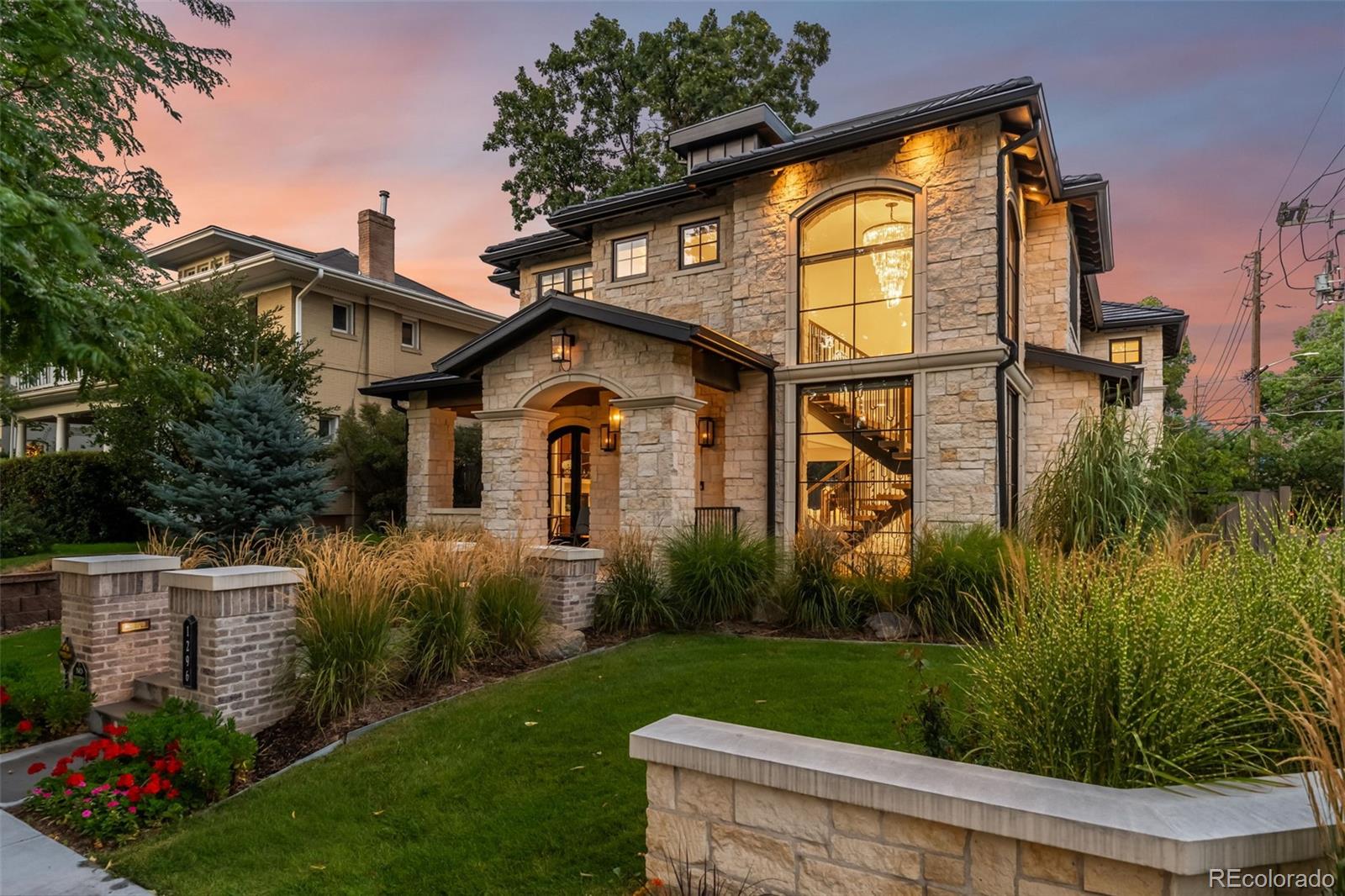 1296 South York Street Denver, CO 80210 - Photo 2 of 49 a front view of a house with garden