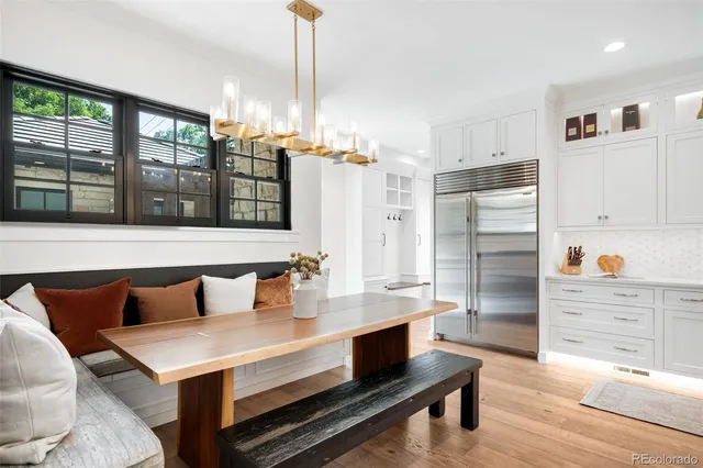 a living room with a couch and a fireplace
