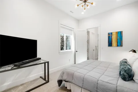 a kitchen with a stove a sink and a microwave