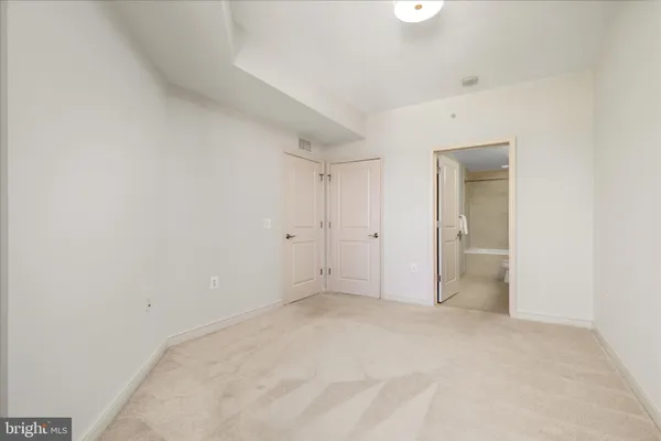 a view of a building with sitting area