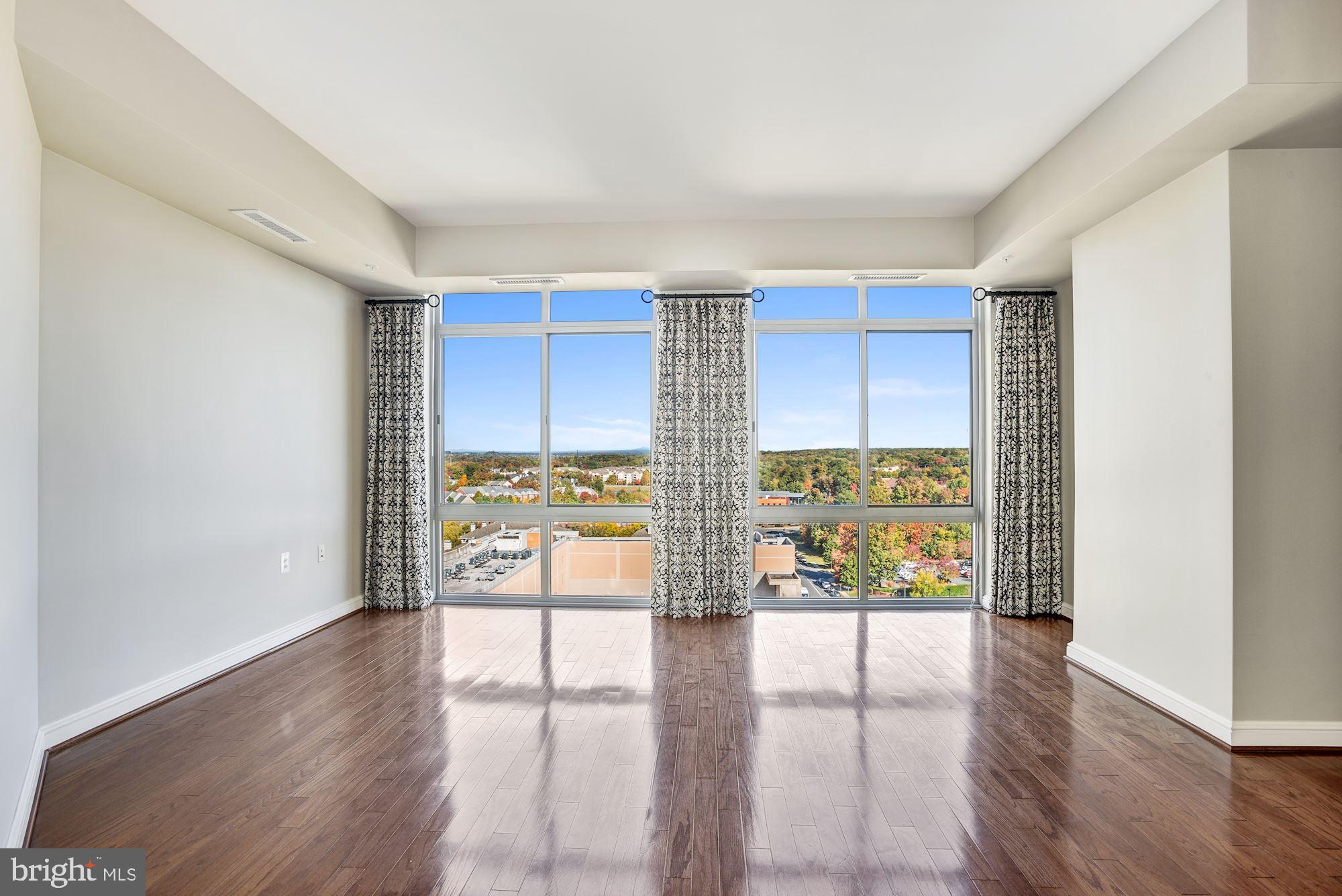 11990 Market Street, Unit 1106 Reston, VA 20190 - Photo 6 of 48 Living Room | Main Level