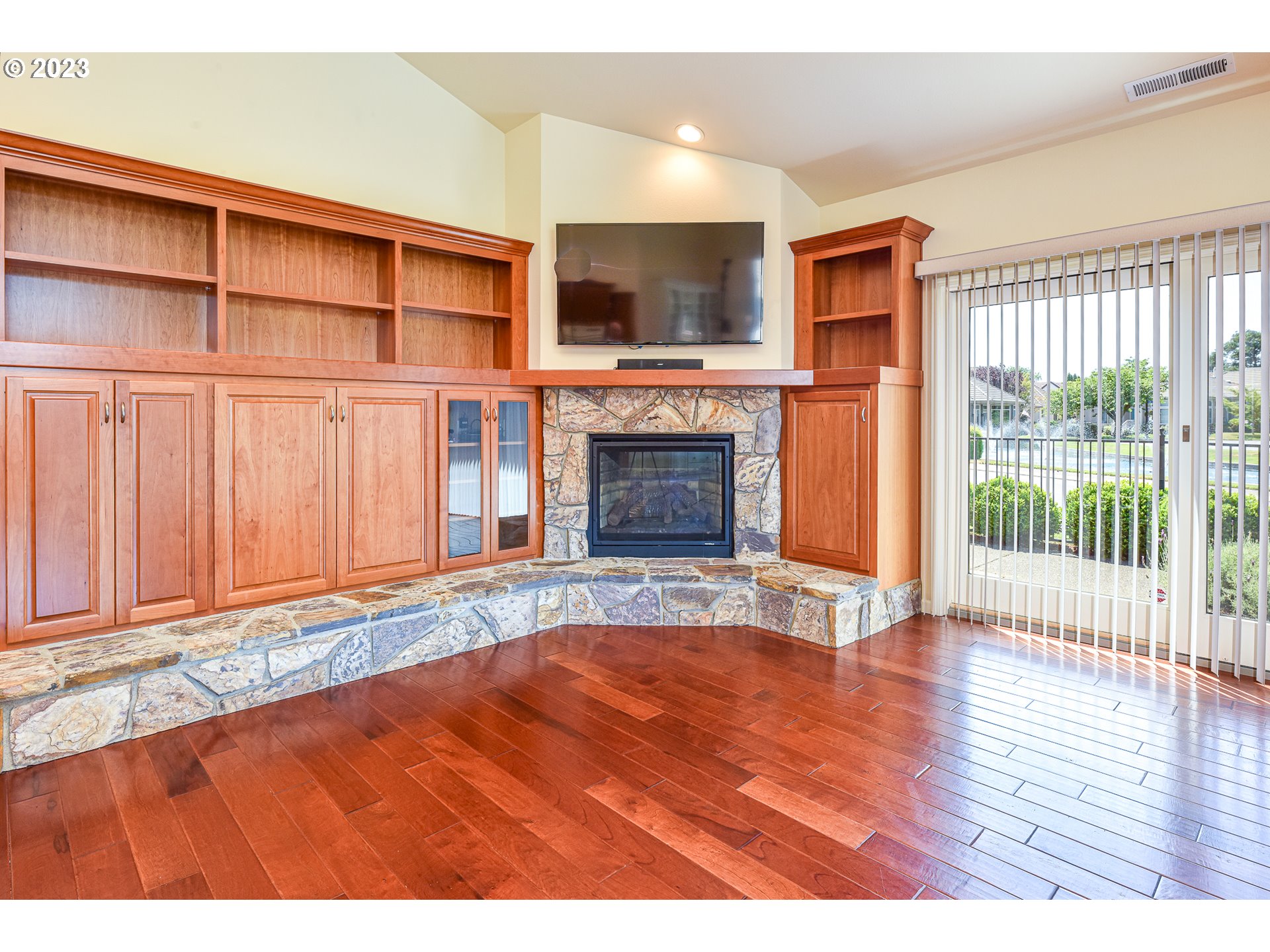 2002 Lake Shore Drive Eugene, OR 97408 - Photo 14 of 37 a view of an empty room with a fireplace and a window