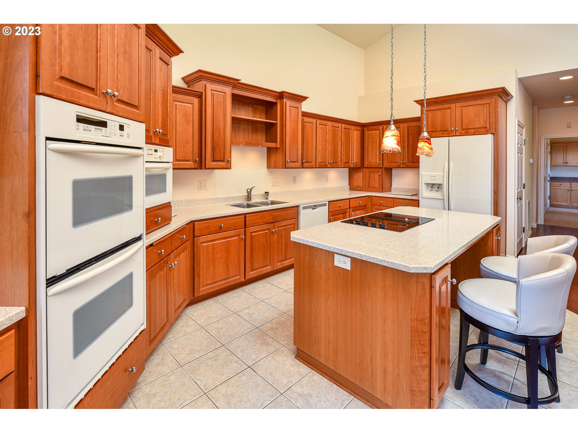 2002 Lake Shore Drive Eugene, OR 97408 - Photo 17 of 37 a kitchen with stainless steel appliances a stove a sink refrigerator and a microwave