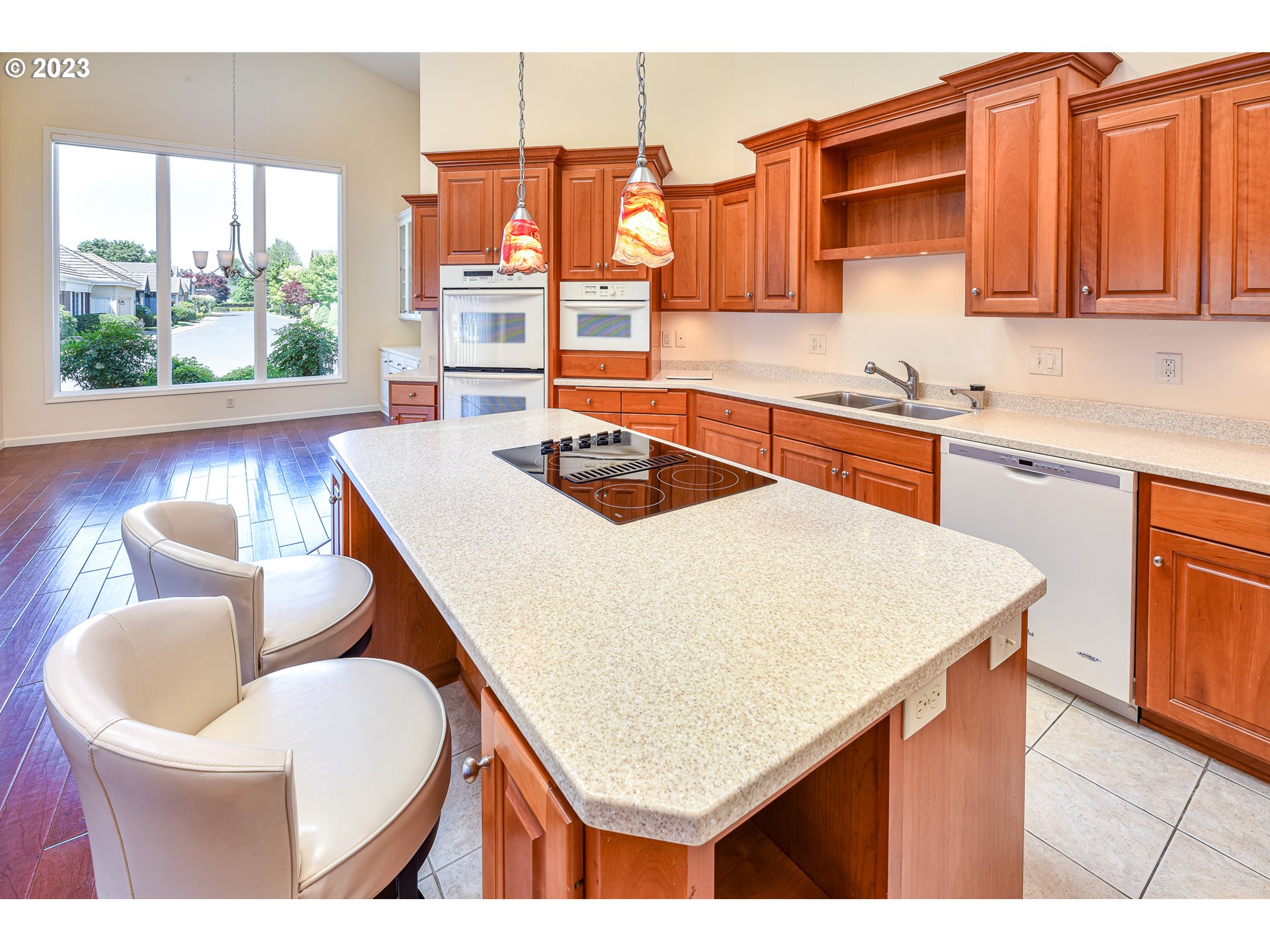 2002 Lake Shore Drive Eugene, OR 97408 - Photo 20 of 37 a kitchen with a stove a sink and a refrigerator