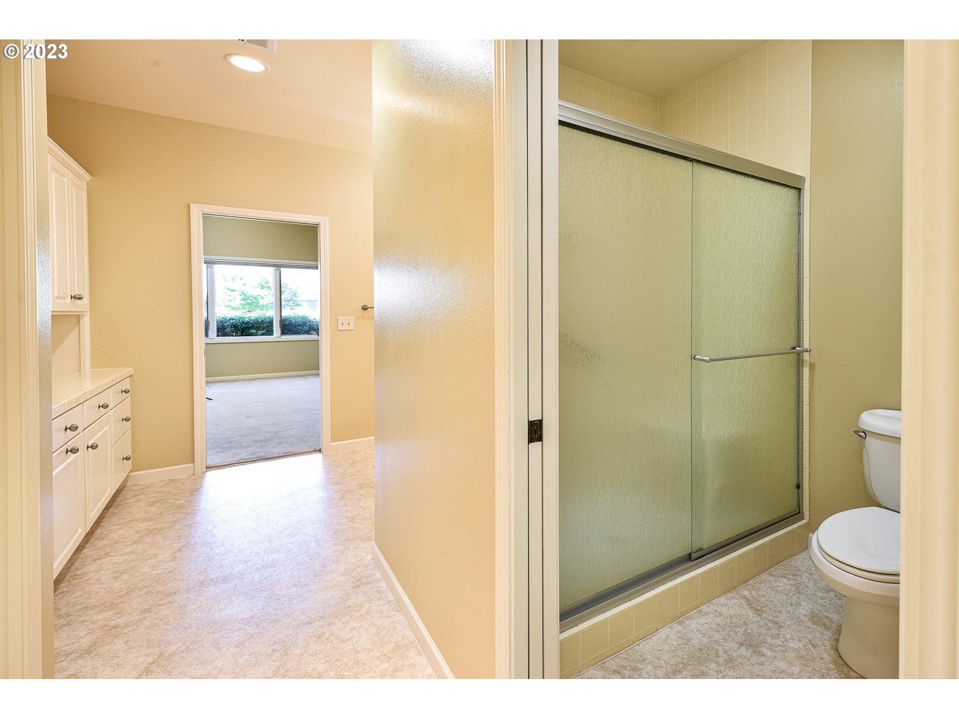 2002 Lake Shore Drive Eugene, OR 97408 - Photo 26 of 37 a bathroom with a shower and a toilet