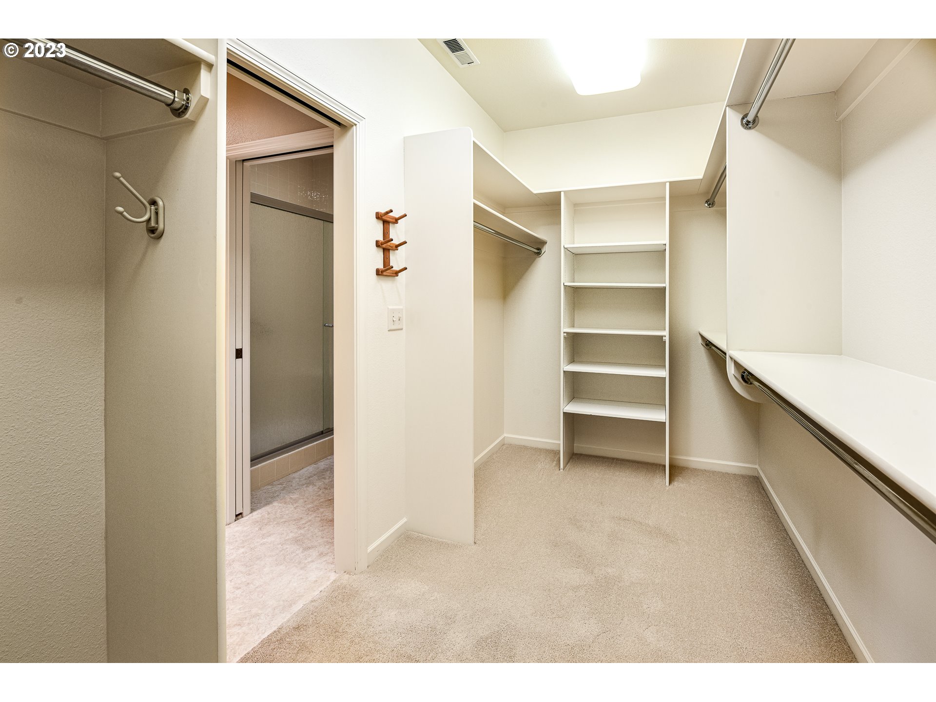 2002 Lake Shore Drive Eugene, OR 97408 - Photo 27 of 37 a view of closet area with empty racks