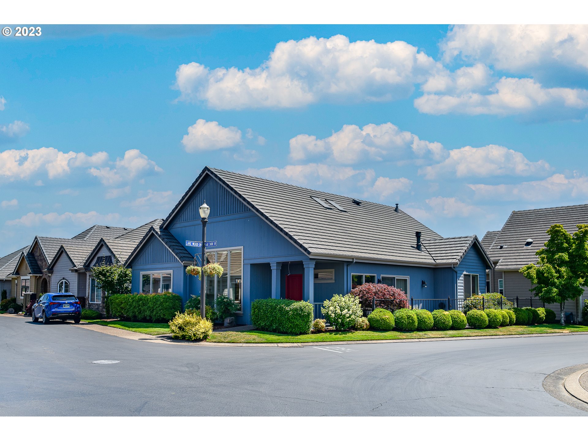 2002 Lake Shore Drive Eugene, OR 97408 - Photo 3 of 37 a front view of a house with a garden and pathway