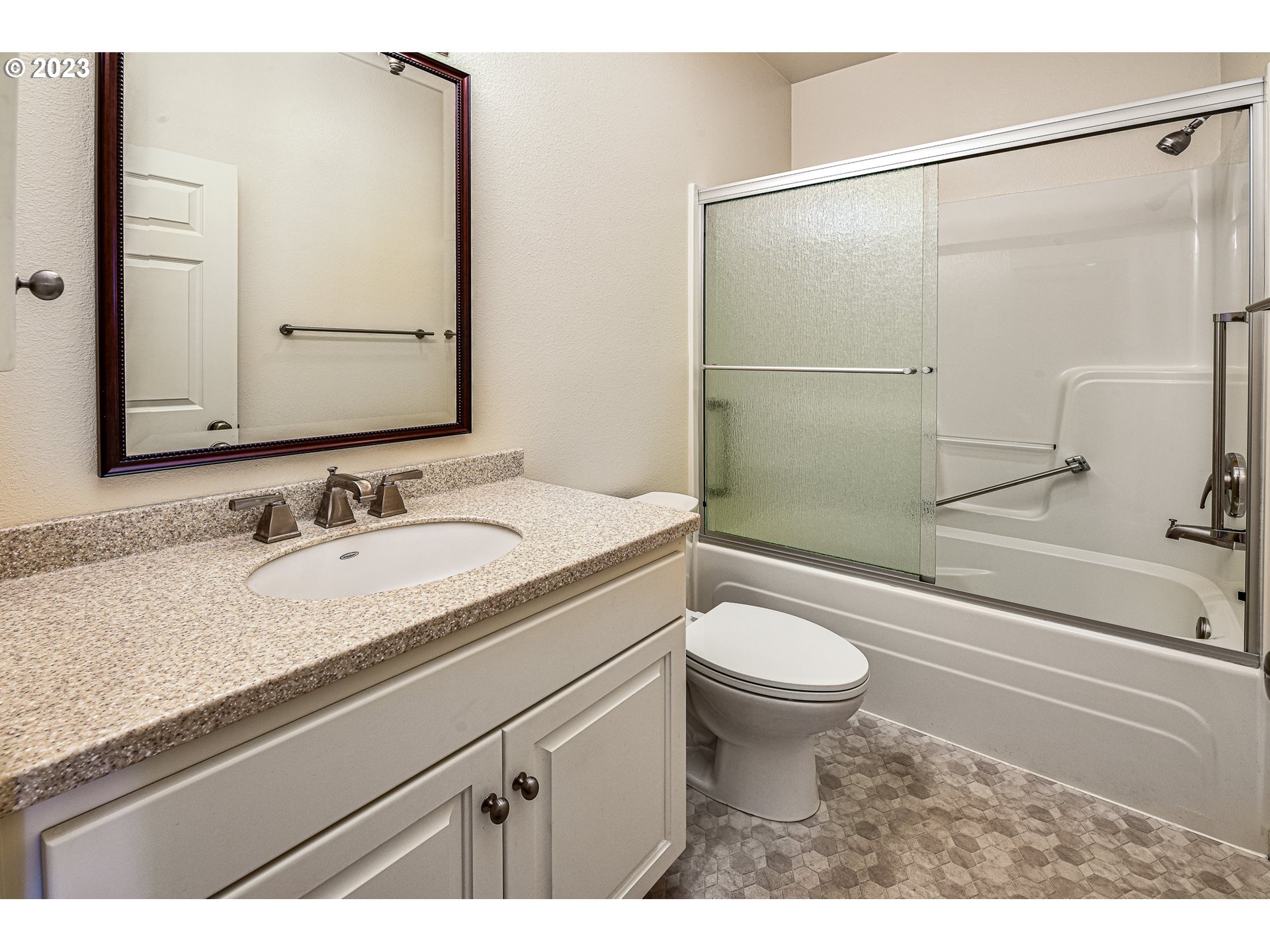 2002 Lake Shore Drive Eugene, OR 97408 - Photo 31 of 37 a bathroom with a granite countertop sink toilet and shower