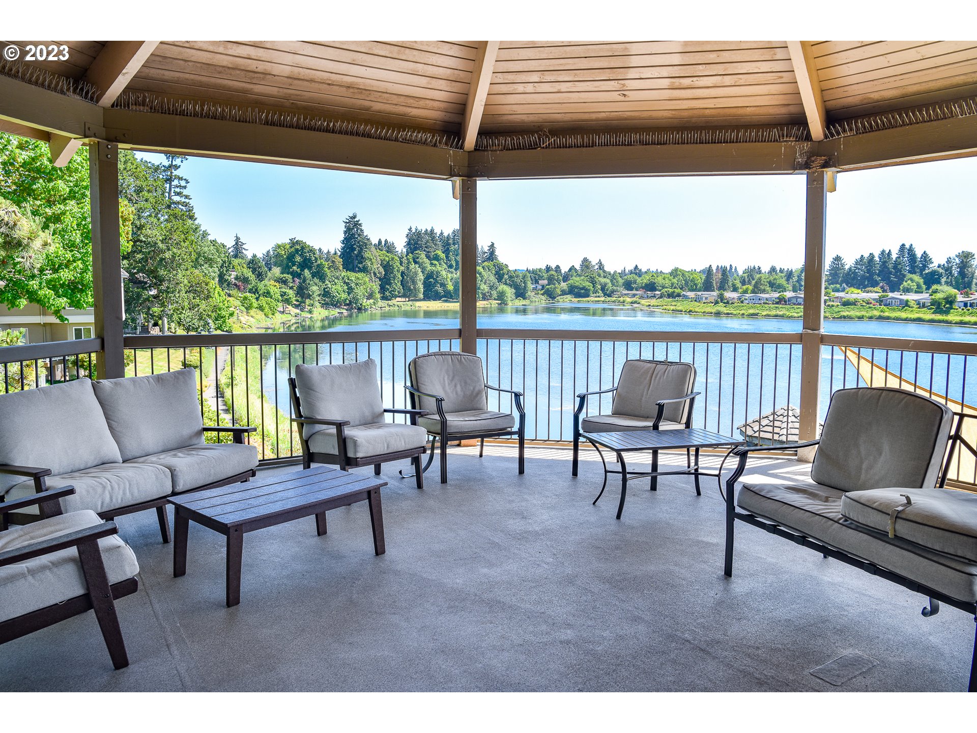 2002 Lake Shore Drive Eugene, OR 97408 - Photo 36 of 37 a living room with furniture and a floor to ceiling window