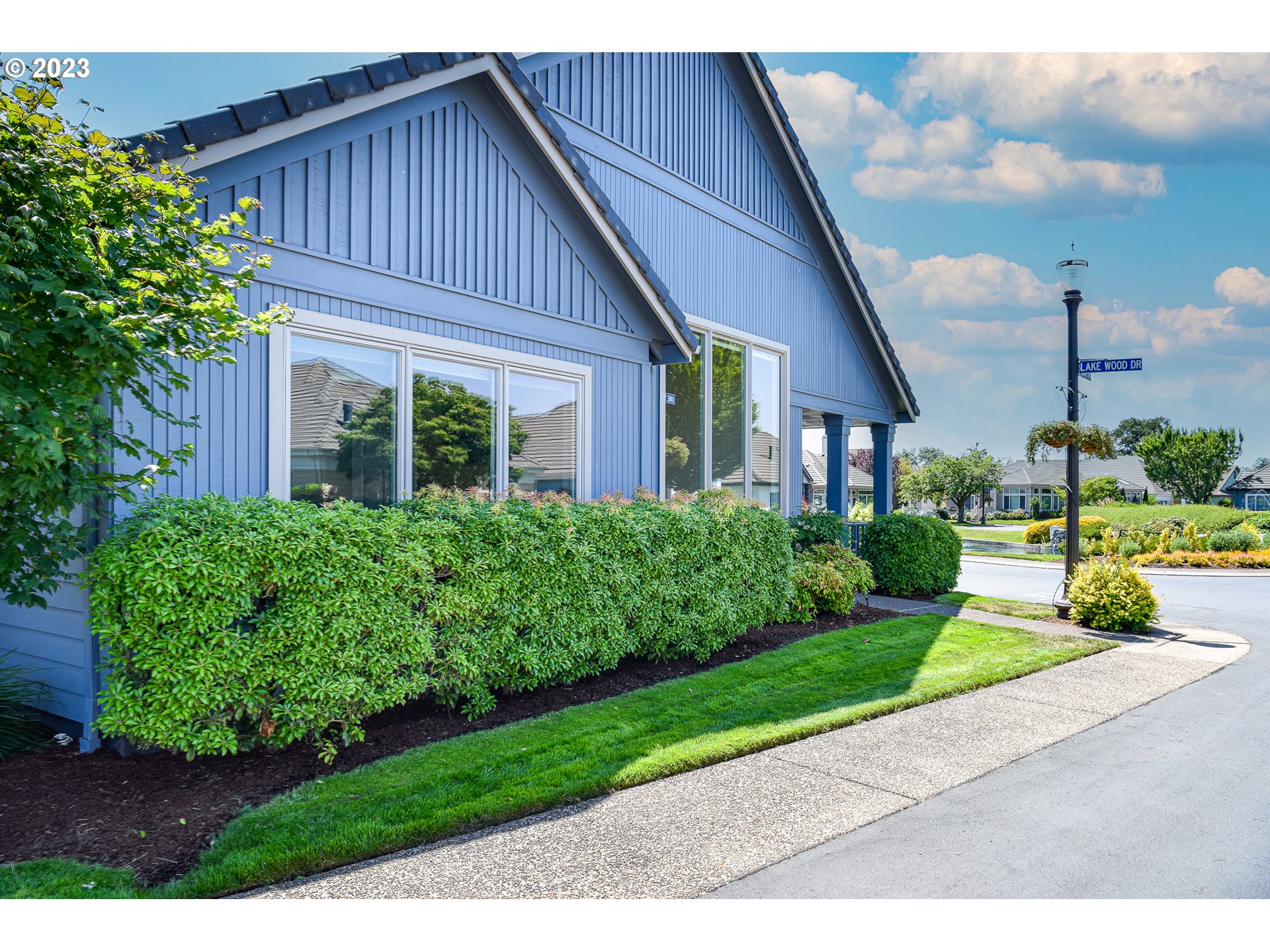 2002 Lake Shore Drive Eugene, OR 97408 - Photo 8 of 37 a front view of a house with a yard