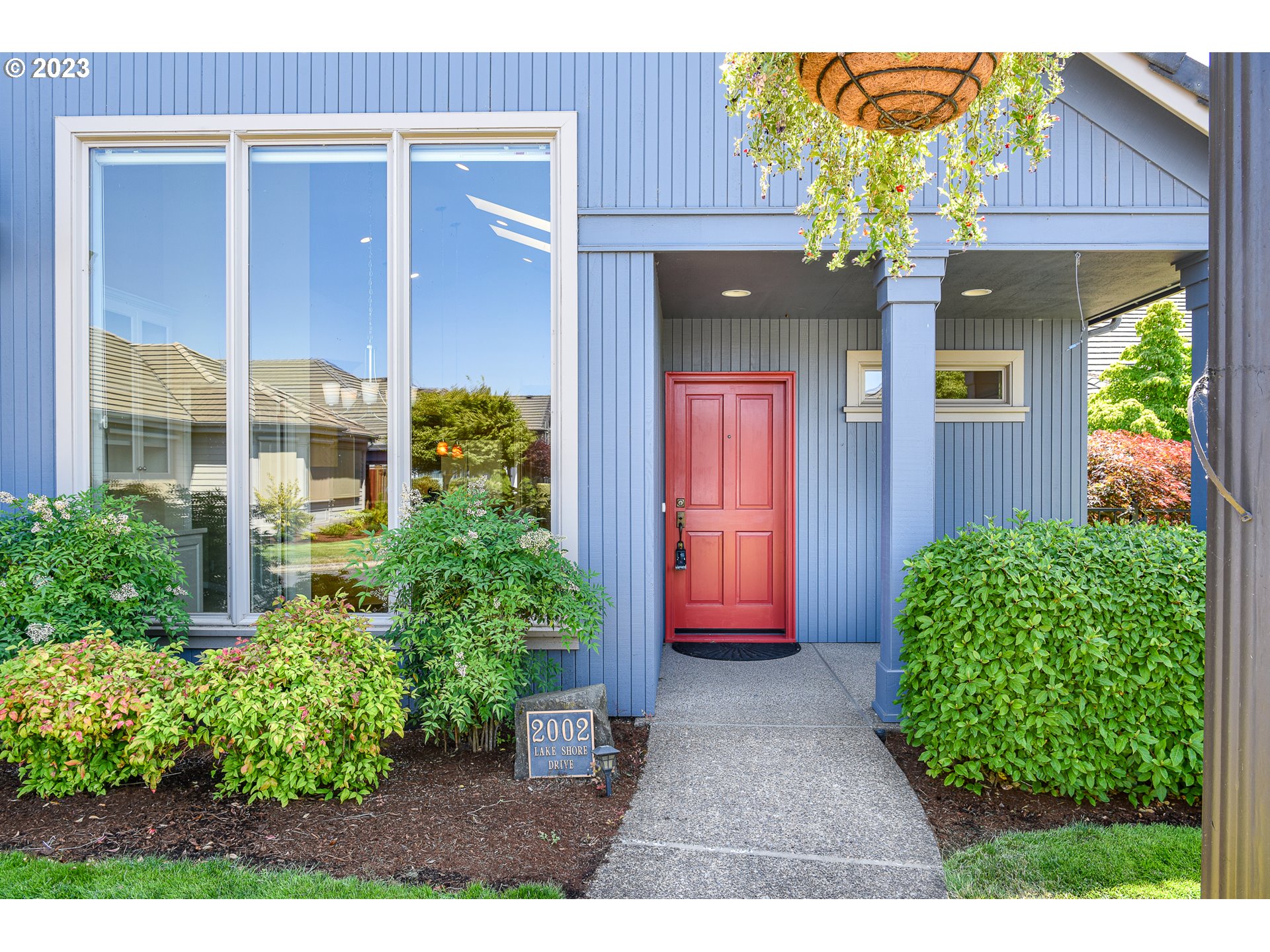 2002 Lake Shore Drive Eugene, OR 97408 - Photo 9 of 37 a front view of a house with a yard