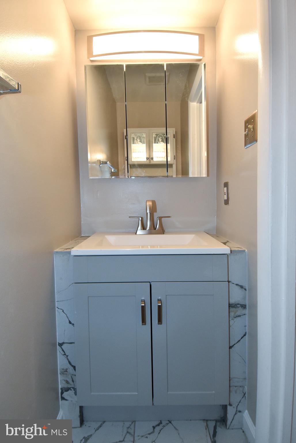 3122 Berry Road Northeast, Unit 22 Washington, DC 20018 - Photo 16 of 20 Half bathroom on main floor