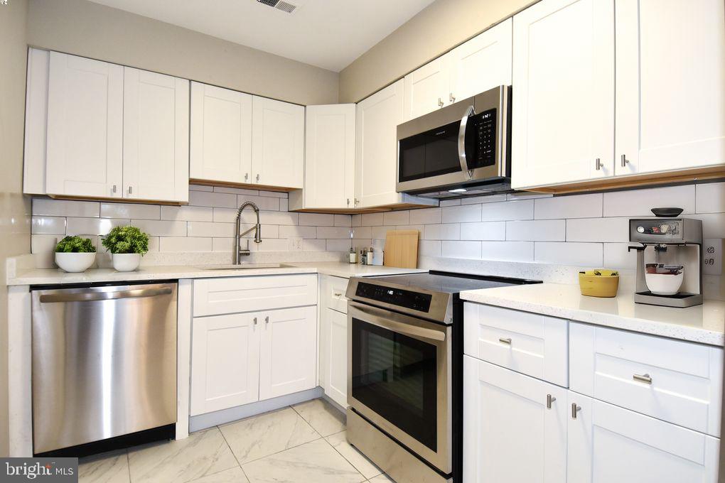 3122 Berry Road Northeast, Unit 22 Washington, DC 20018 - Photo 6 of 20 Brand new appliances/Quartz countertops