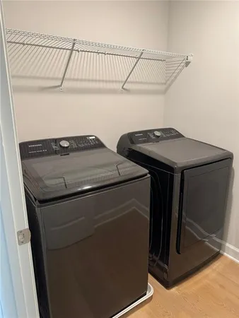 a utility room with dryer and washer