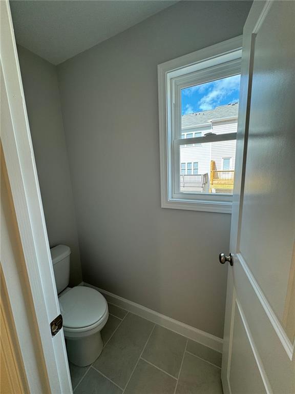 1925 Appian Alley Kennesaw, GA 30144 - Photo 18 of 27 a white toilet sitting next to a window
