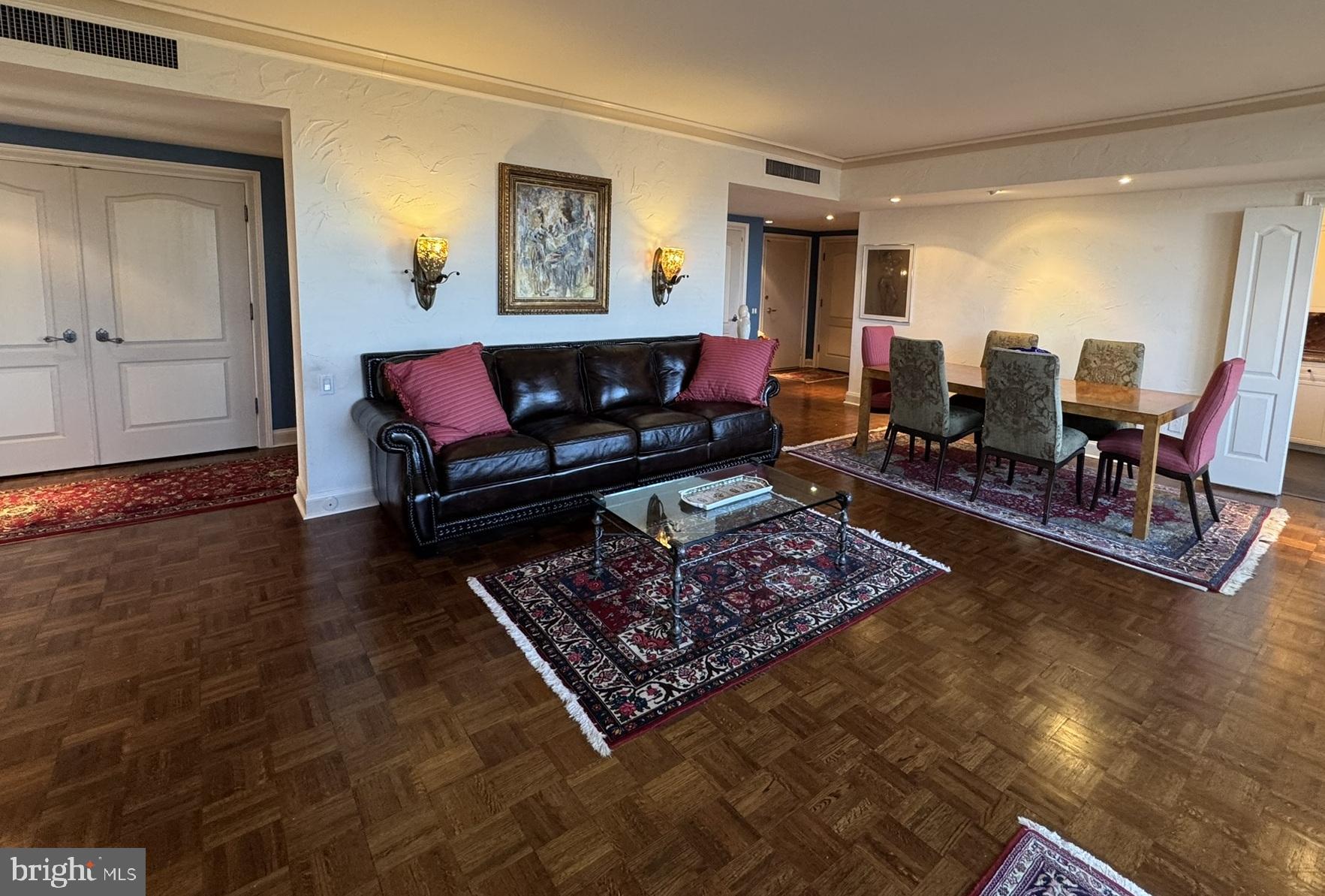 191 Presidential Boulevard, Unit R816 Bala Cynwyd, PA 19004 - Photo 13 of 42 a living room with furniture and a rug
