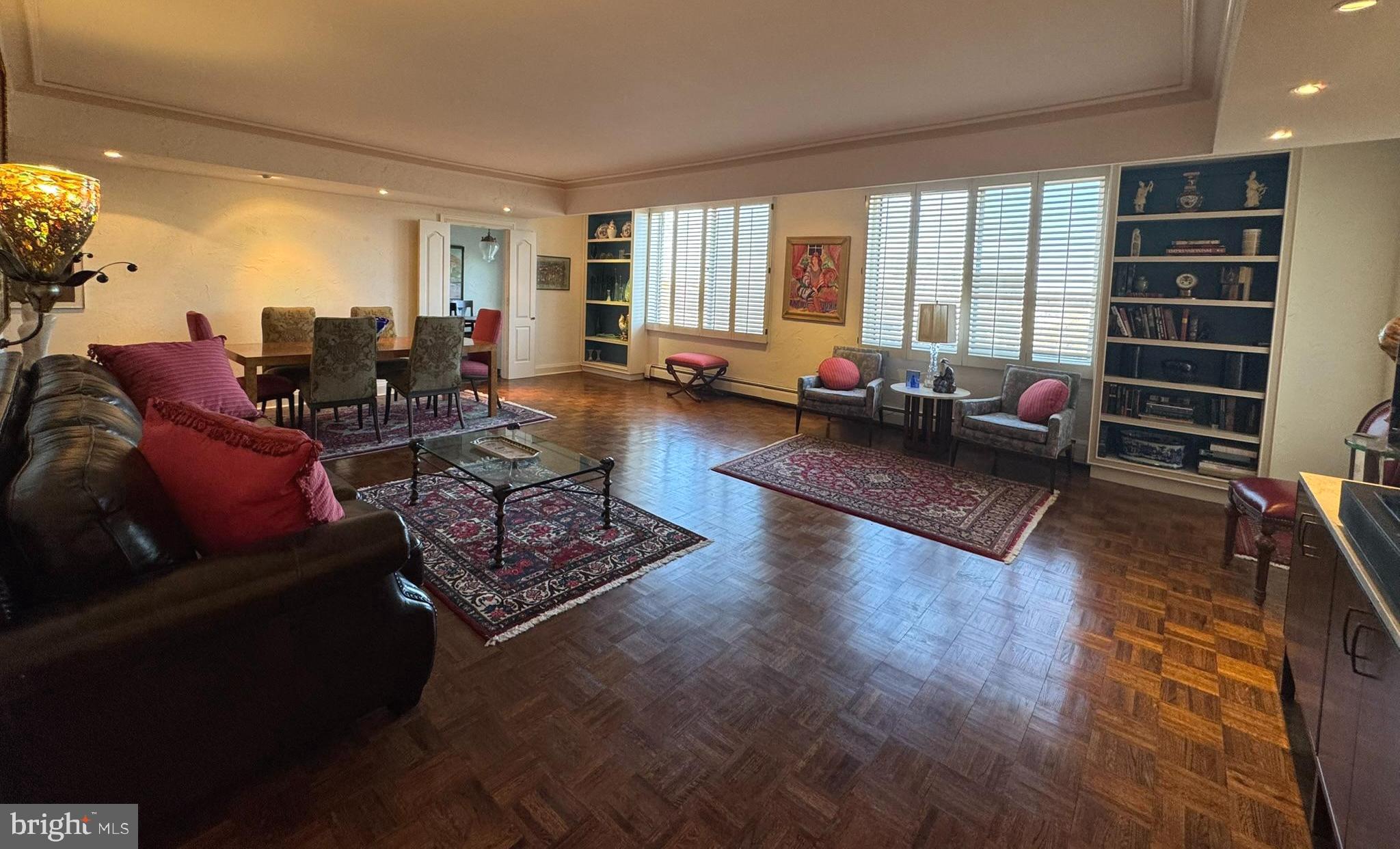 191 Presidential Boulevard, Unit R816 Bala Cynwyd, PA 19004 - Photo 20 of 42 a living room with furniture hard wood floor and a window