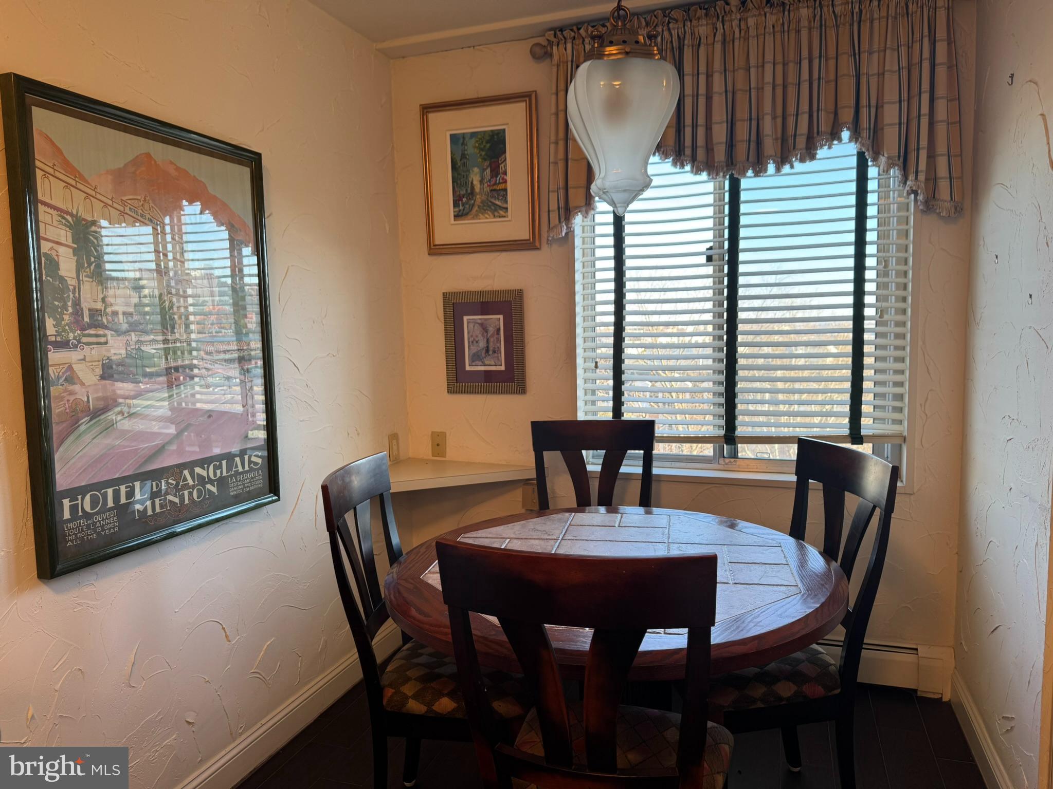 191 Presidential Boulevard, Unit R816 Bala Cynwyd, PA 19004 - Photo 27 of 42 a view of a dining room with furniture and window