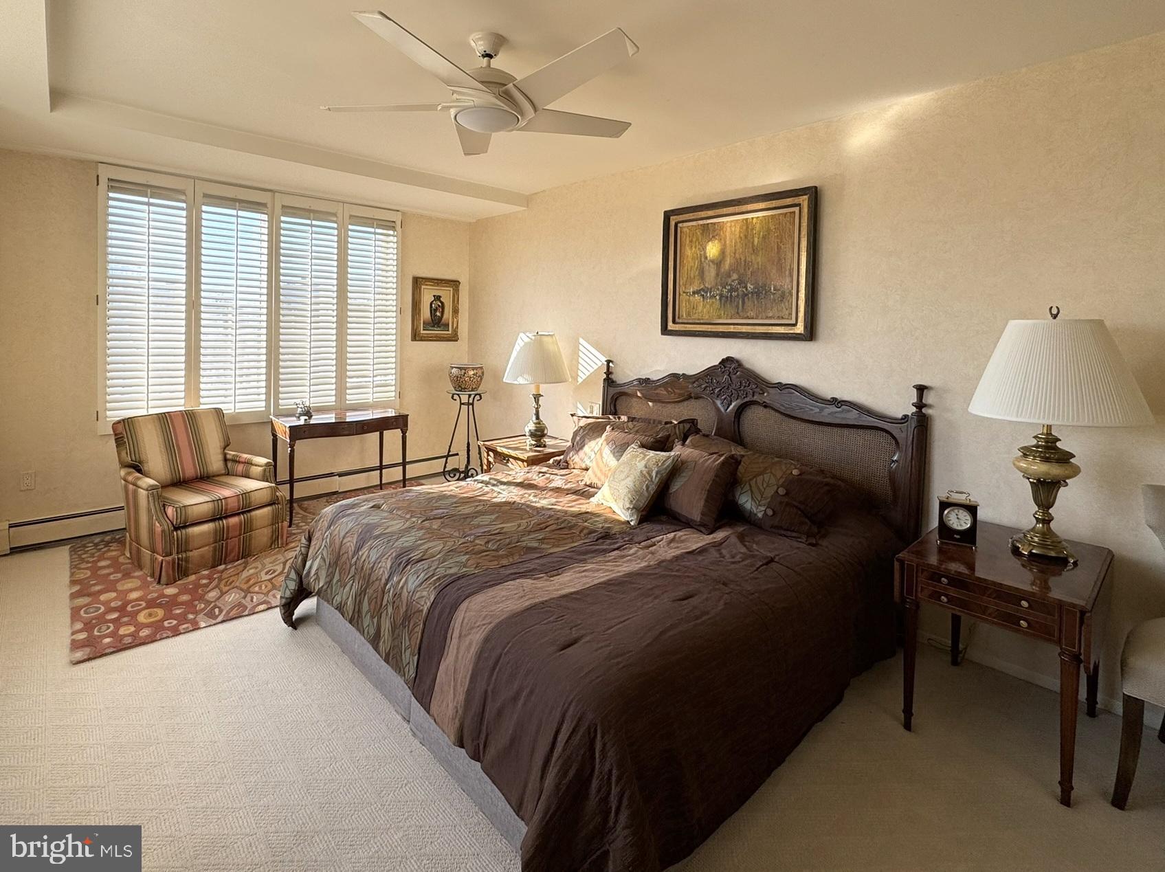 191 Presidential Boulevard, Unit R816 Bala Cynwyd, PA 19004 - Photo 31 of 42 a bedroom with bed couch and window