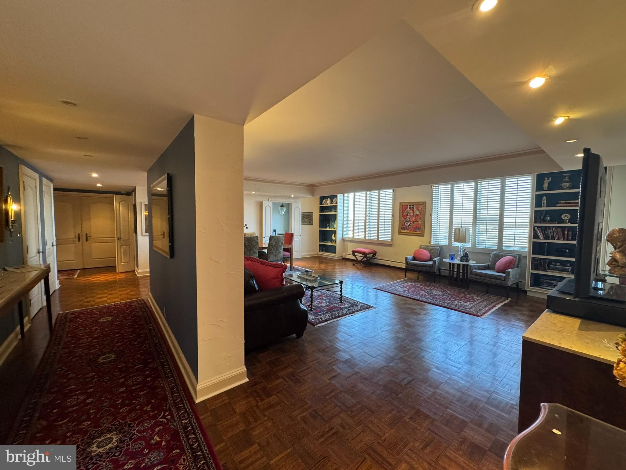 191 Presidential Boulevard, Unit R816 Bala Cynwyd, PA 19004 - Photo 40 of 42 a living room with furniture and a flat screen tv