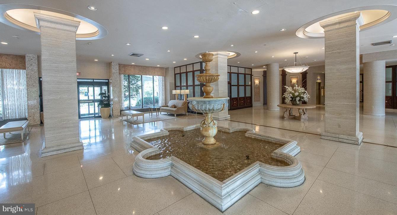 191 Presidential Boulevard, Unit R816 Bala Cynwyd, PA 19004 - Photo 5 of 42 a living room with dining room and kitchen view