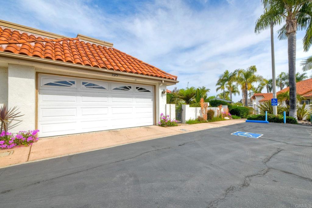 3579 Twilight Lane Oceanside, CA 92056 - Photo 1 of 30 a front view of a house with a yard and garage
