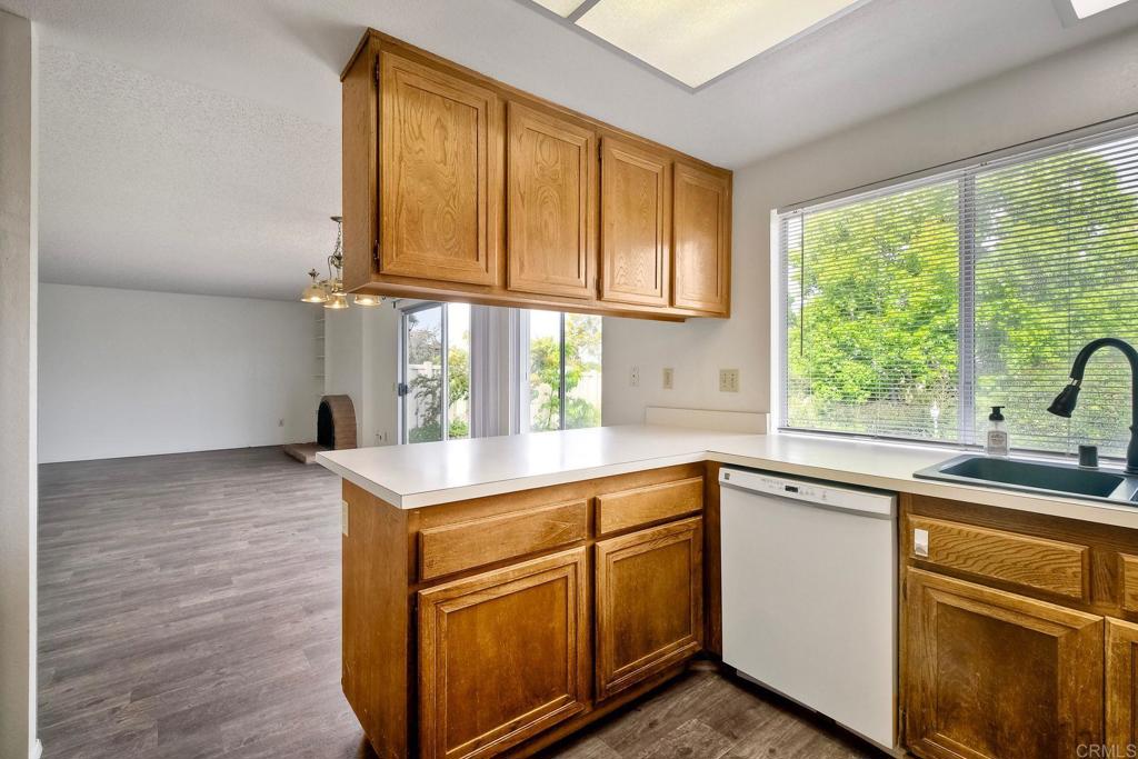 3579 Twilight Lane Oceanside, CA 92056 - Photo 13 of 30 a kitchen that has a sink and a large window